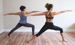 Two ladies at a pilates class